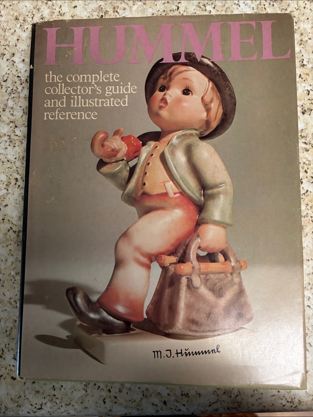 Hummel Hardcover Guide with Pink Title and Green Jacket Illustration
